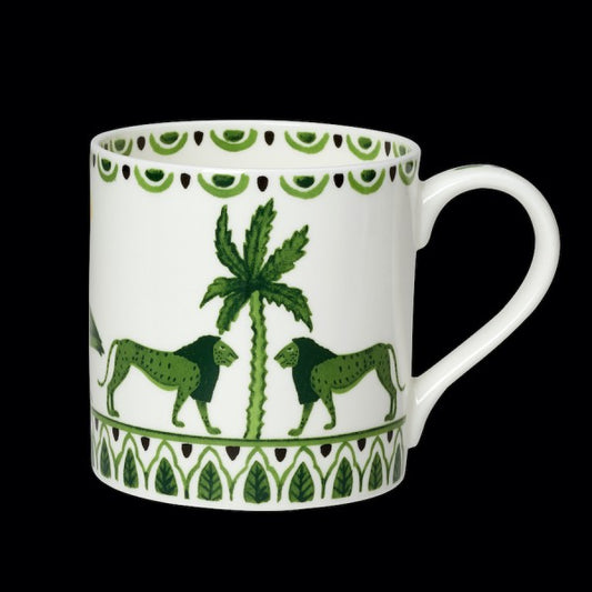 Tasse mit grünem Tiermotiv.