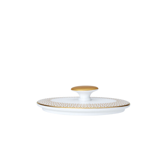Porzellandeckel mit goldenen Verzierungen.