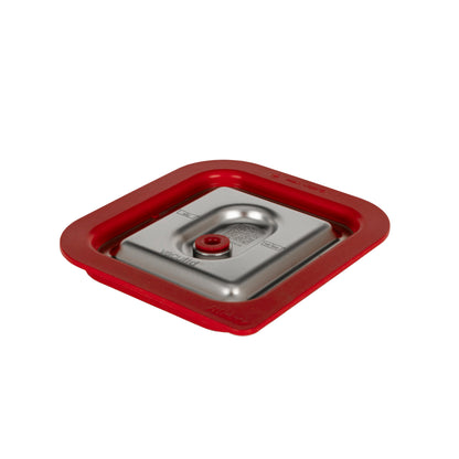 Roter Deckel mit Metallmitte.