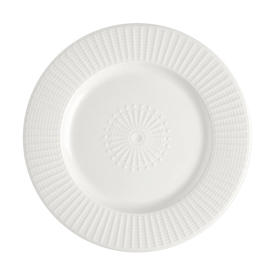 Weißer, strukturierter Porzellanteller obenansicht.