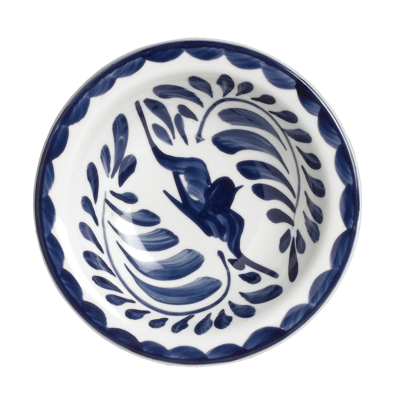 Blauer Teller mit Vogelmotiv.