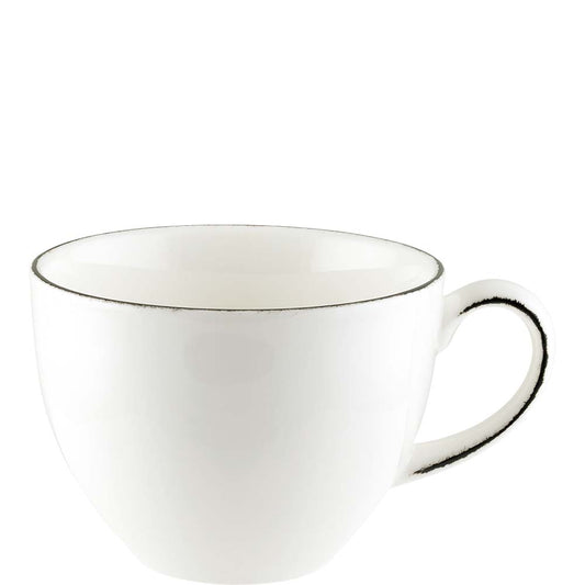 Weiße Tasse mit schwarzem Rand.
