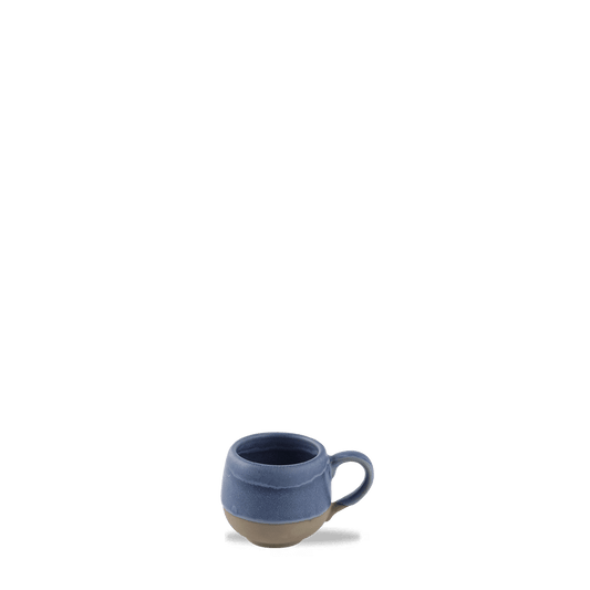 Blaue Kaffeetasse auf Tisch