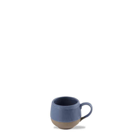 Blaue Kaffeetasse auf Tisch