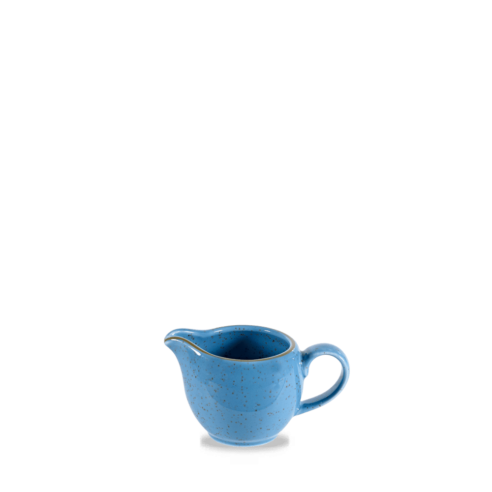 Blaue Kaffeekanne auf Tisch