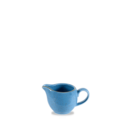 Blaue Kaffeekanne auf Tisch