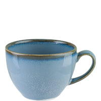 Blaue Keramiktasse mit Henkel.