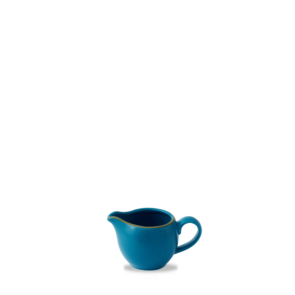 Blaue Kaffeekanne auf Tisch