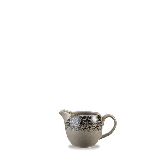 Kleiner, grauer Keramik-Milchkrug.