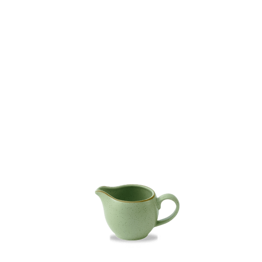 Grüne Kaffeekanne auf Tisch