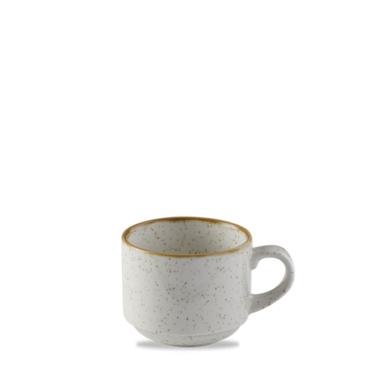 Weiße Tasse mit Sprenkeln.