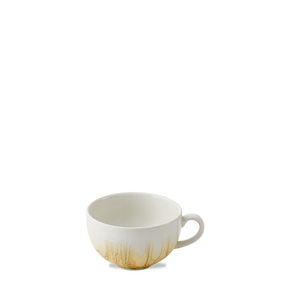 Weiße Tasse mit gelbem Muster.