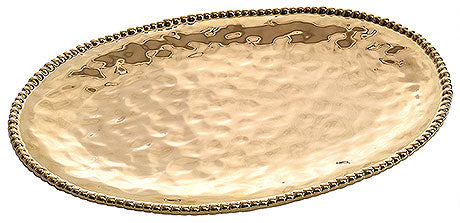 Goldenes, gehämmertes Serviertablett oval.