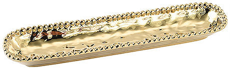 Goldenes Tablett mit Perlenrand.