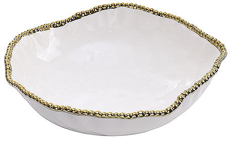 Weiße Schale mit goldener Verzierung.