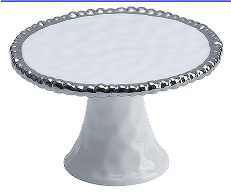 Tortenständer mit silbernem Rand.