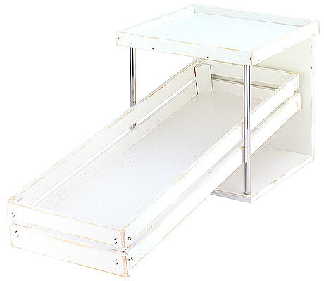 Weißes Displayregal mit Schubladen.