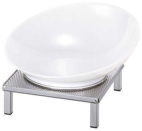 Weiße Schale auf Metallständer.