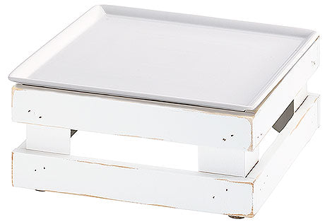 Weißes Tablett auf Holzständer.