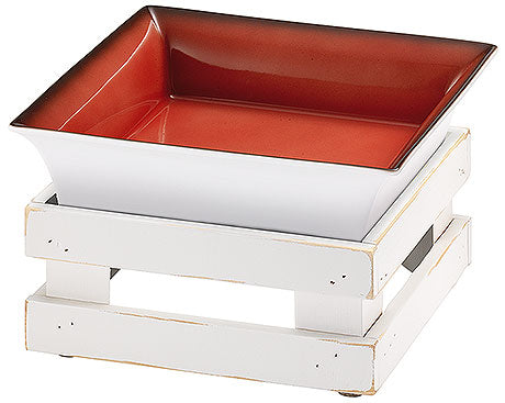 Schale auf weißem Holzgestell.