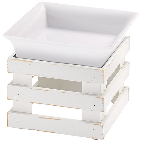 Weiße Schale auf Holzgestell.