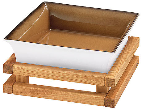 Schale auf Holzgestell.