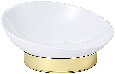 Weiße Schale auf goldenem Sockel.