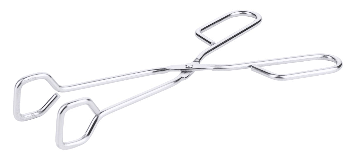 Silberne Servierzange aus Metall.