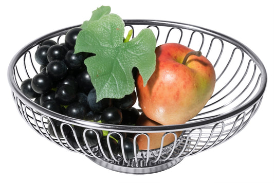 Obstschale mit Äpfeln und Trauben.