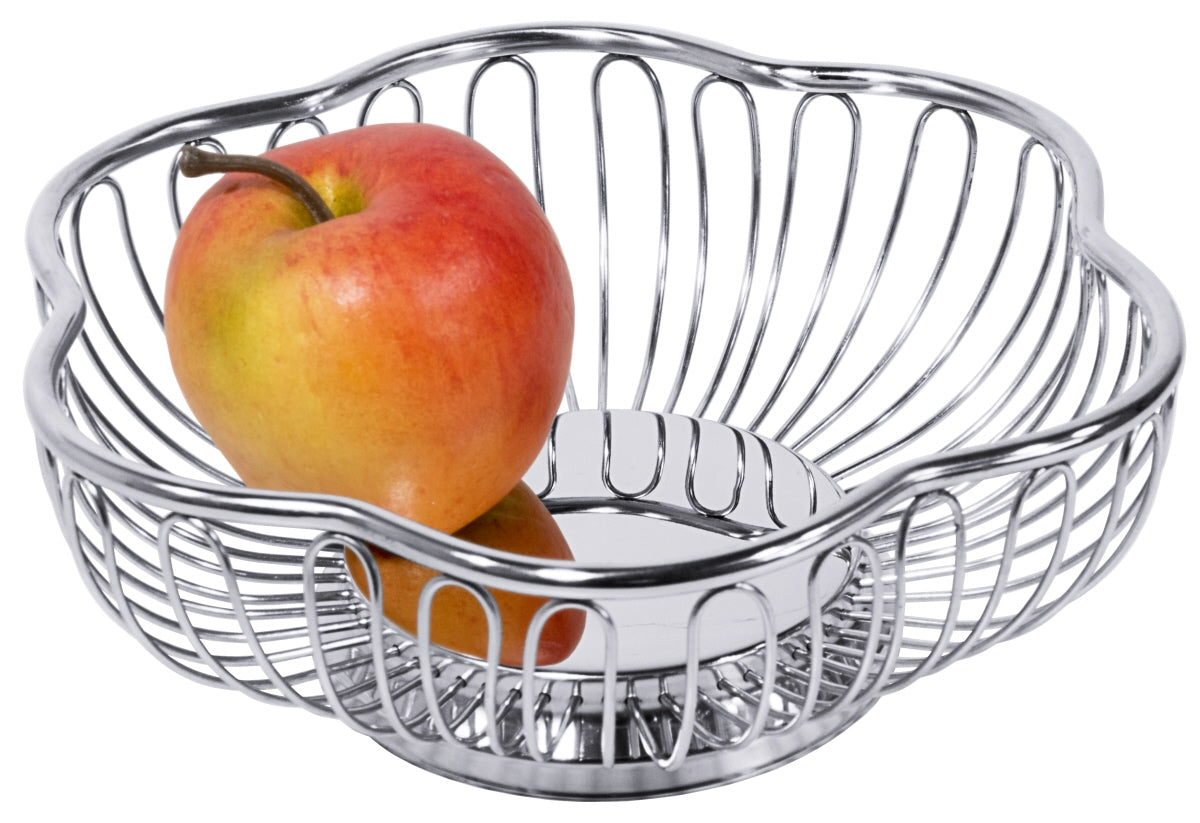 Drahtkorb mit Apfel.