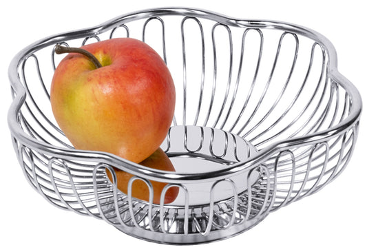 Drahtkorb mit Apfel.