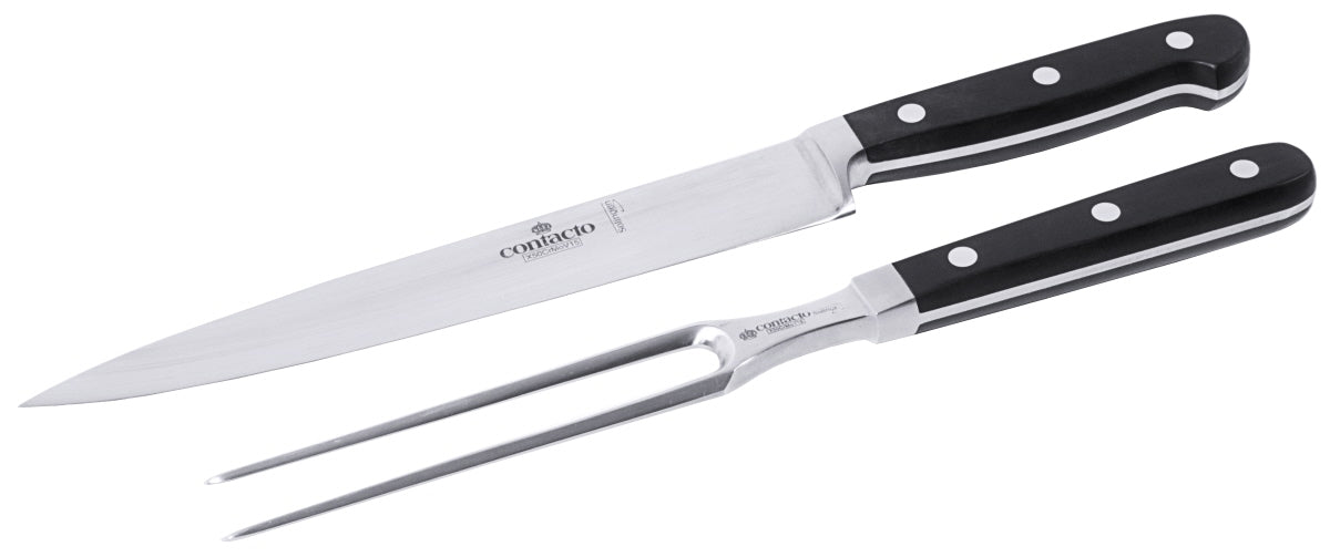 Tranchiermesser und -gabel auf Weiß.
