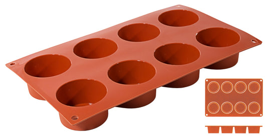Rote Silikon-Backform mit Vertiefungen.