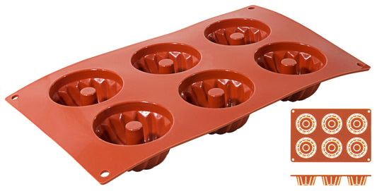Rote Silikon-Backform mit Vertiefungen.