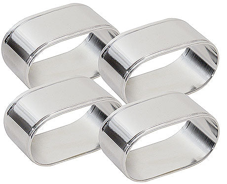 Vier silberne Serviettenringe.