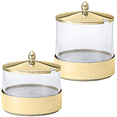 Zwei goldene Vorratsbehälter mit Deckel.