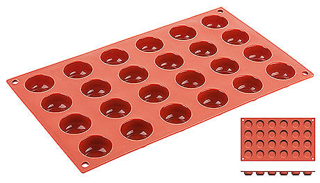 Rote Silikonbackform mit Mulden.