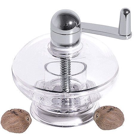 Nussmühle mit zwei Nüssen.